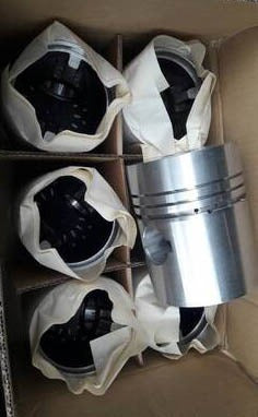 Marine engine cylinder piston